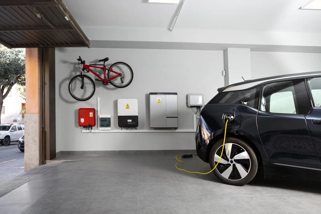 An electric car charging at home.